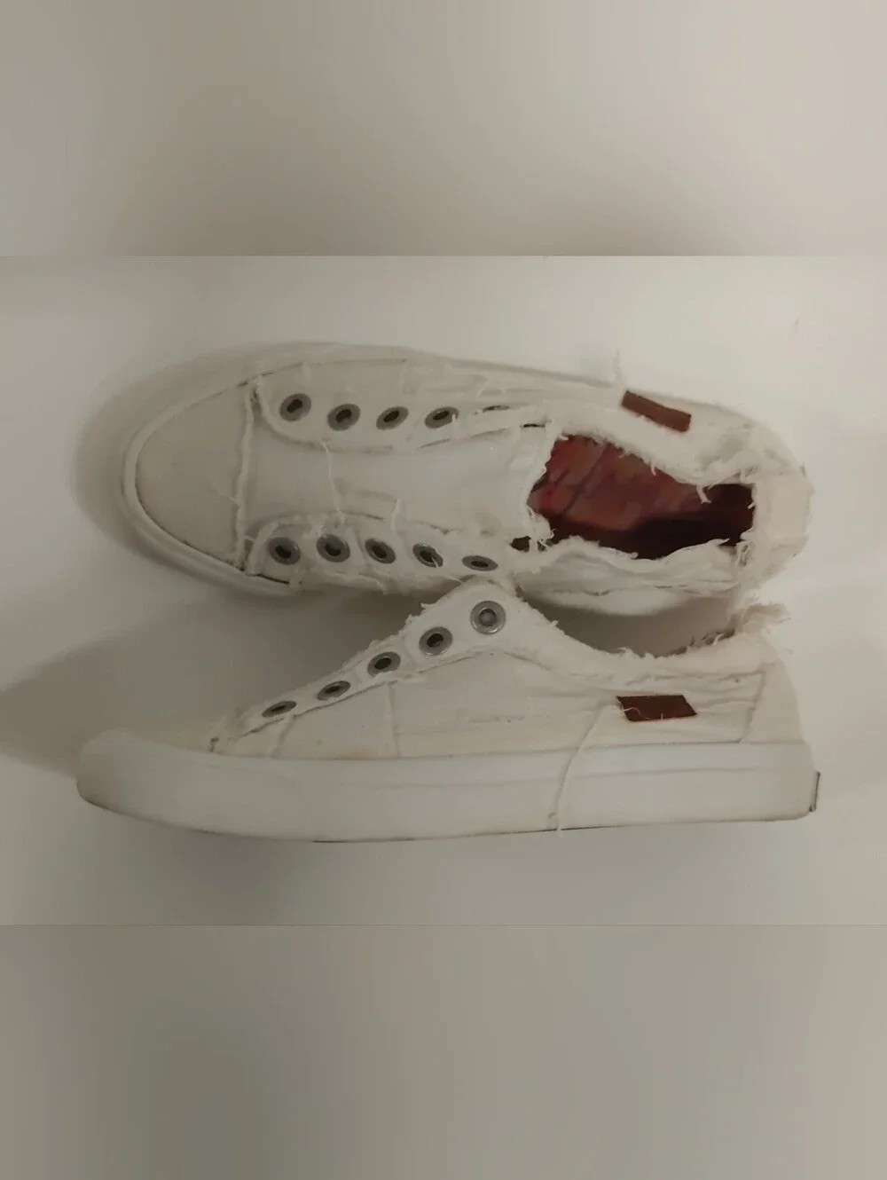Women's White Canvas Slip-On Sneakers with Frayed Trim